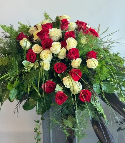 Whispering Roses Casket Spray
